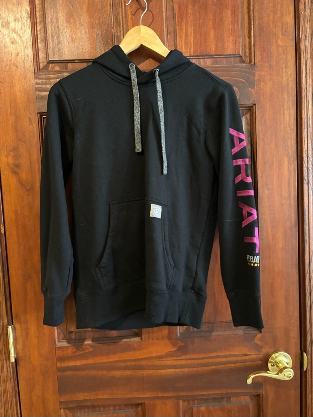Ariat Black Pullover Hoodie with Pink Sleeve Logo
